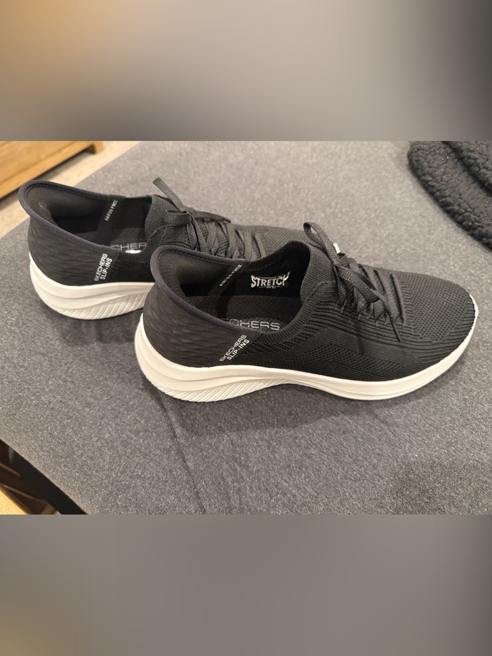 Skechers Women’s Black Knit Slip-On Sneakers with White Sole